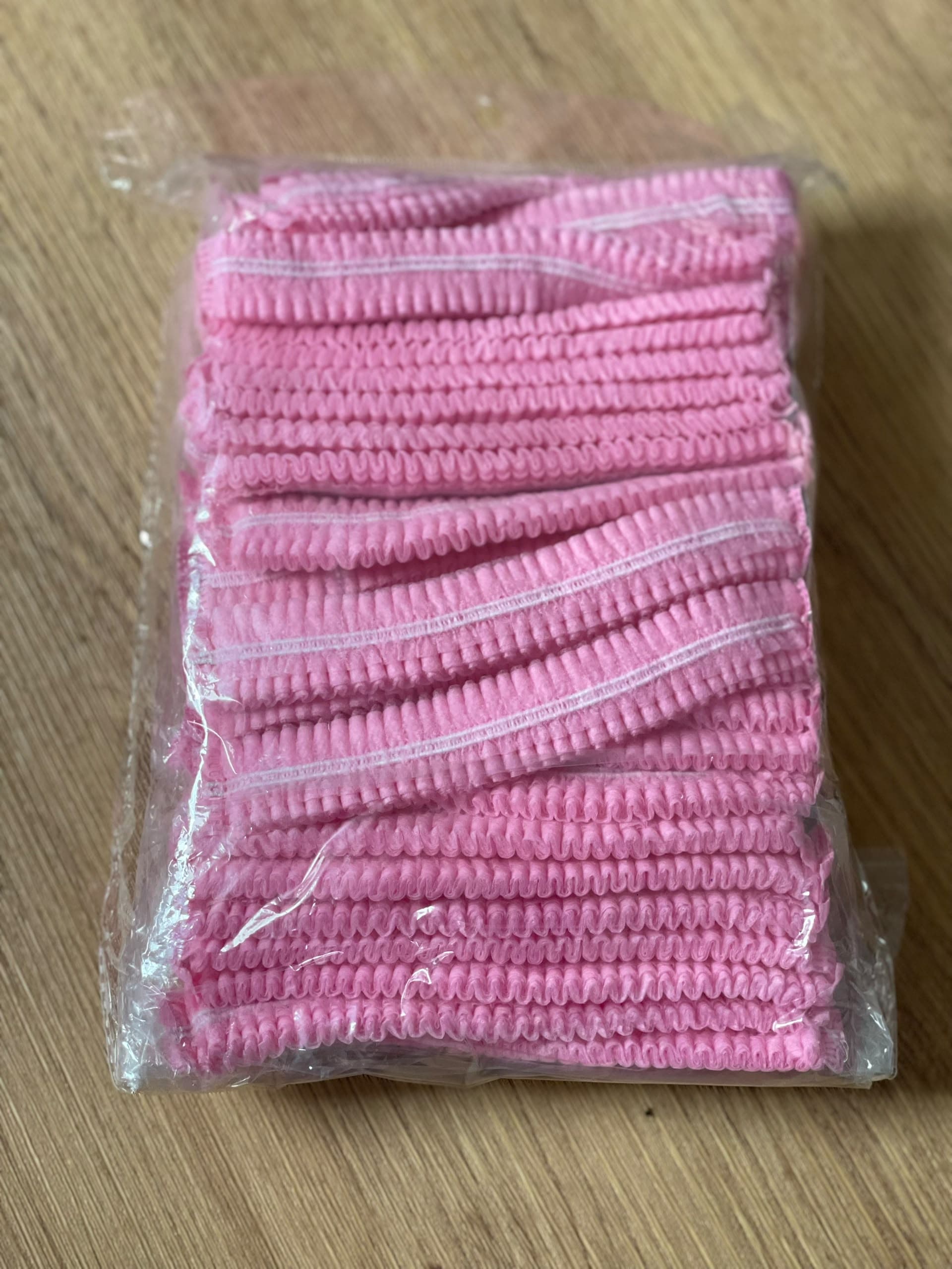 Gorritos desechables rosados — 50 unidades